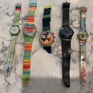5 Swatch watches. Some have damage. Just need a new band and a battery